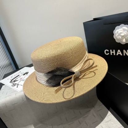 Picture of Chanel's flat-topped top hat, straw hat, and accessories made of haircloth