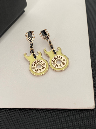 Picture of Chanel's Avocado Green Guitar Earrings